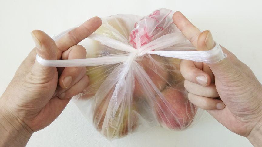 塑料袋系扣方法图解