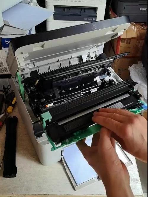 兄弟打印机换了墨粉盒还显示更换
