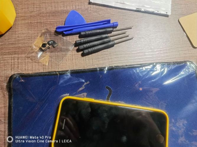 苹果8后摄像头金属圈怎么拆