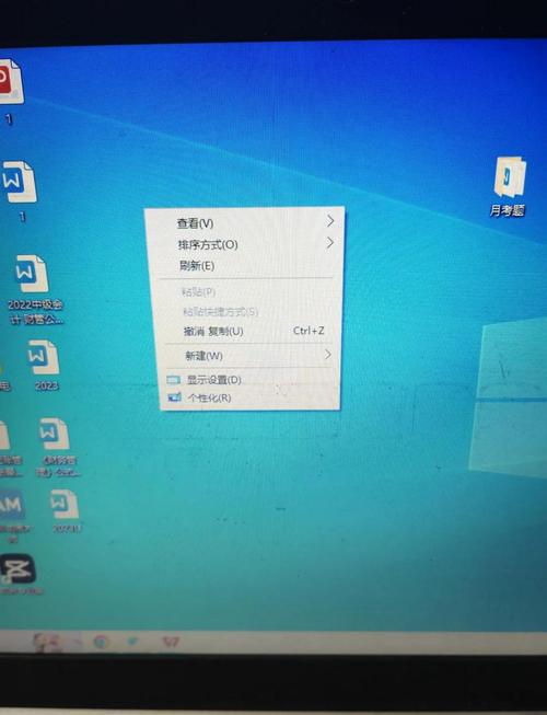 如何把电脑下面的任务栏拉下去