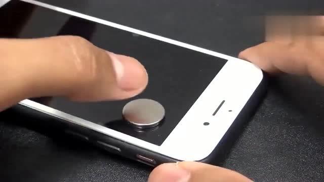贴在手机后面的磁铁怎么拿下来